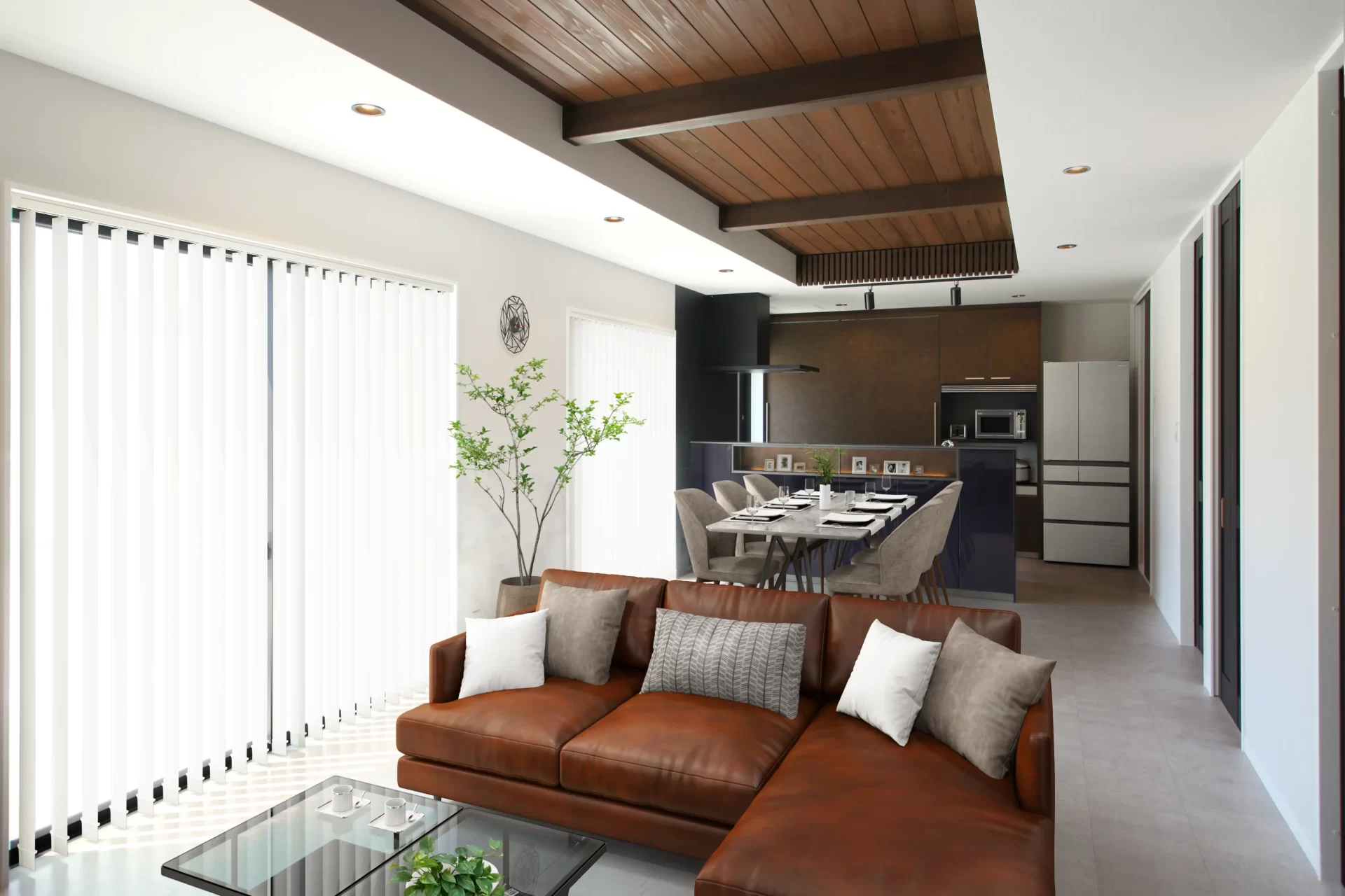 大蒲の家のリビングダイニングキッチン。長手方向すべてを南面にして明るくなるようにしています。天井は一部構造体の梁をあらわしにしているもの特徴です。